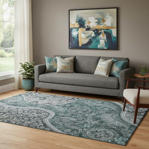 HomeRoots 5' X 8' Teal Charcoal & Ivory Paisley Area Rug - Washable, UV-Protected, Kid & Pet Friendly Design 683760