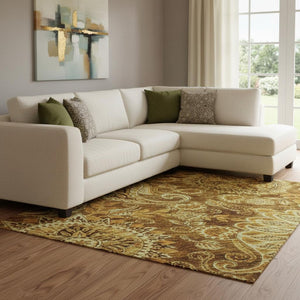 HomeRoots 10' X 14' Elegant Terra Cotta and Beige Paisley Area Rug - UV Protected, Washable, Durable Design 683770