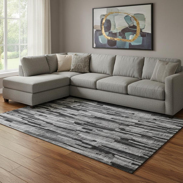 HomeRoots 10' Gray and Silver Striped Washable Area Rug with Stain Resistance, UV Protection, and Slip-Reducing Backing 683788