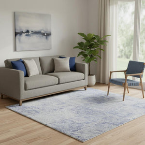 HomeRoots 5' X 8' Stylish Sky Blue & Ivory Geometric Area Rug - Washable, UV-Protected, Stain-Resistant Design! 683850