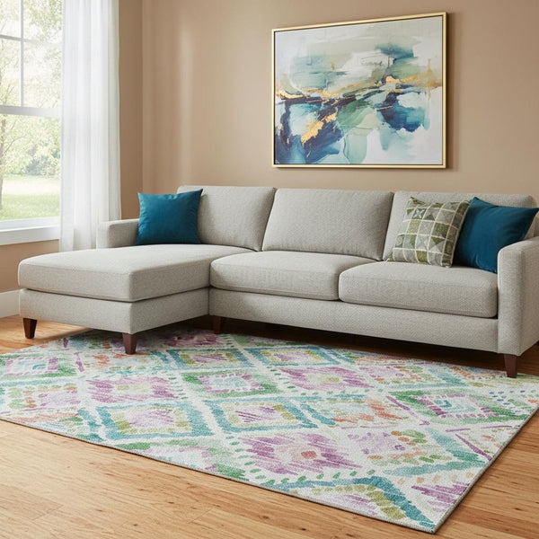 HomeRoots 10' X 14' Washable Geometric Area Rug in Teal, Ivory, Green & Purple - UV Protected & Stain Resistant 684046