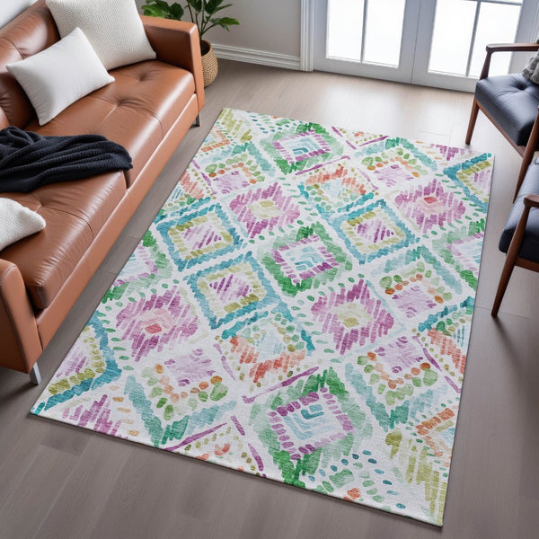 HomeRoots 10' X 14' Washable Geometric Area Rug in Teal, Ivory, Green & Purple - UV Protected & Stain Resistant 684046