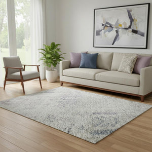 HomeRoots 5' X 8' Elegant Ivory Floral Area Rug with Purple & Blue Accents, Washable & UV Protected Design 684126
