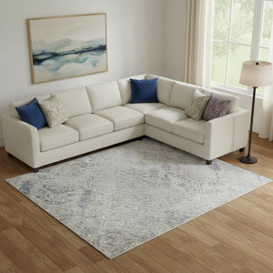 HomeRoots 9' X 12' Washable Floral Area Rug - Ivory Purple & Blue with UV Protection for Family Spaces 684129