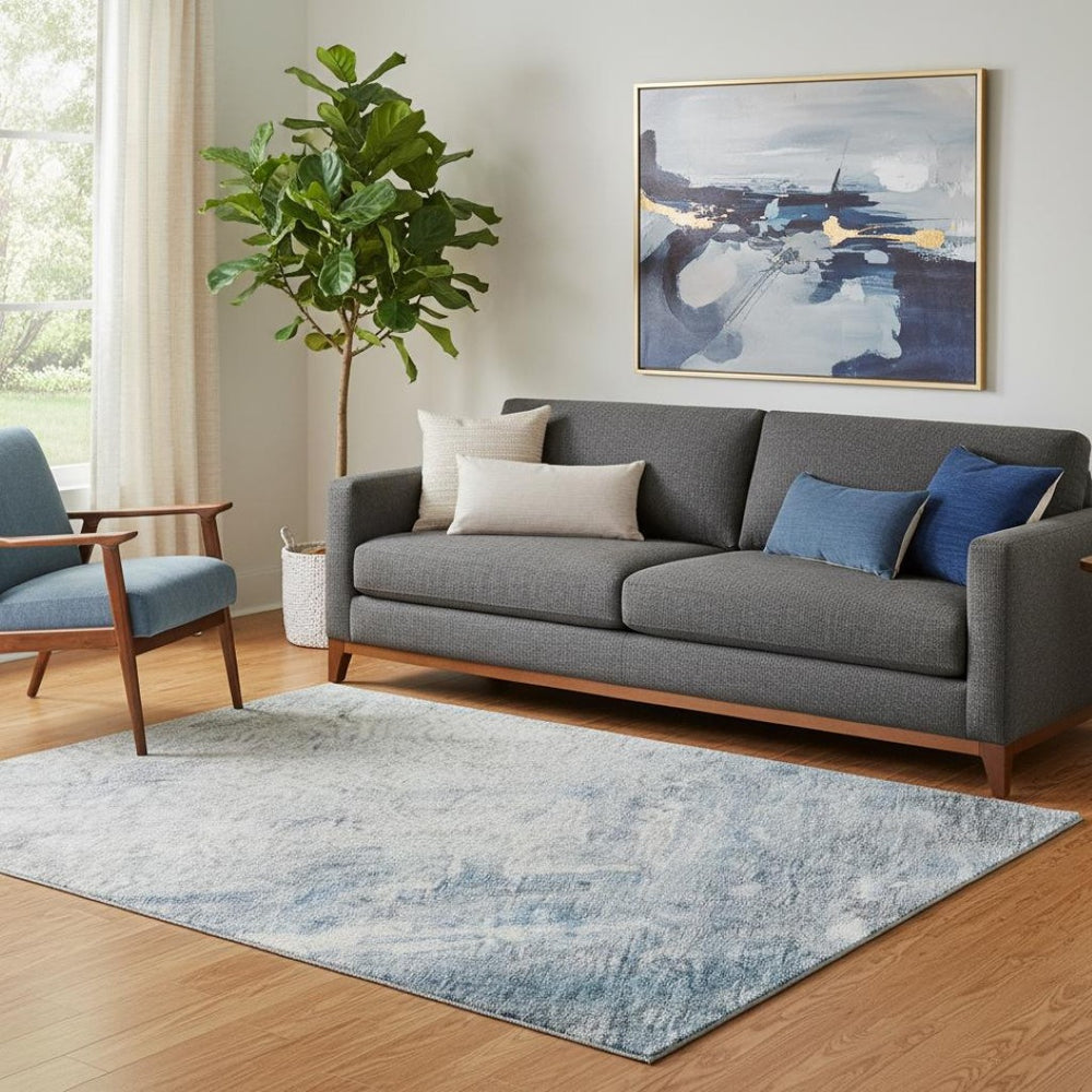HomeRoots 5' X 8' Washable Abstract Area Rug in Blue, Ivory & Gray with UV Protection for Modern Spaces 684168