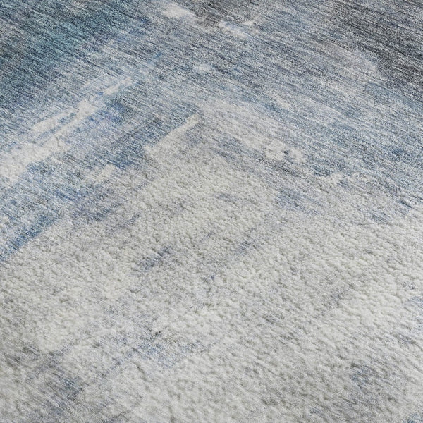 HomeRoots 5' X 8' Washable Abstract Area Rug in Blue, Ivory & Gray with UV Protection for Modern Spaces 684168