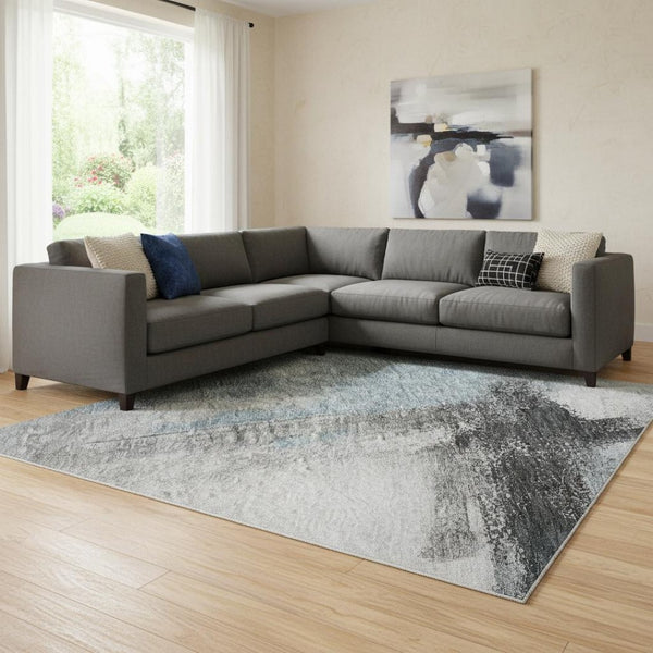 HomeRoots 8' X 10' Abstract Blue Charcoal Ivory Washable Area Rug - Durable, Stain Resistant, UV Protected 684200