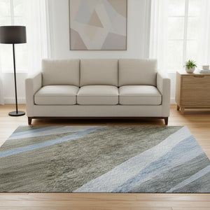 HomeRoots 8' Stunning Brown, Blue & Silver Abstract Washable Round Rug with UV Protection for High Traffic Areas 684235