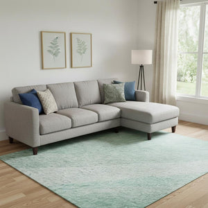 HomeRoots 9' X 12' Aqua and Ivory Abstract Washable Area Rug - UV Protected, Durable for High-Traffic Spaces 684261