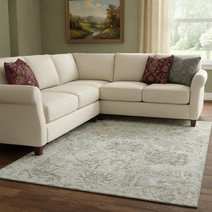 HomeRoots 10' X 14' Ivory and Gray Damask Rug - Washable, UV Protected, Stain-Resistant for High-Traffic Areas 684322