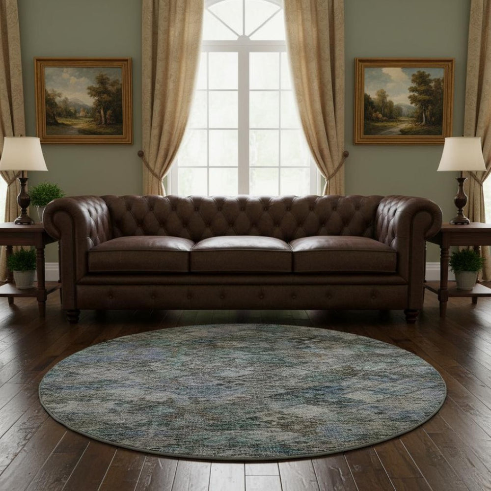 HomeRoots 8' Blue Ivory and Taupe Abstract Geometric Round Rug - Washable, UV-Protected, Stylish & Durable 684531