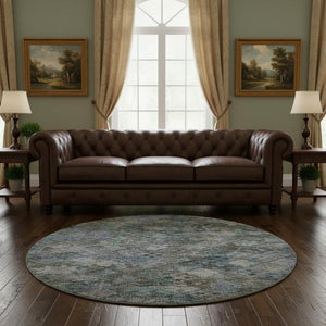 HomeRoots 8' Blue Ivory and Taupe Abstract Geometric Round Rug - Washable, UV-Protected, Stylish & Durable 684531