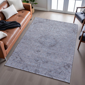 HomeRoots 5' X 8' Blue and Gray Medallion Rug - Washable, UV-Protected, Perfect for Homes with Kids & Pets! 684596