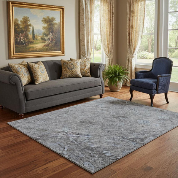 HomeRoots 5' X 8' Blue and Gray Medallion Rug - Washable, UV-Protected, Perfect for Homes with Kids & Pets! 684596
