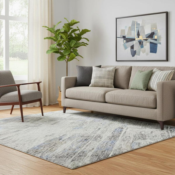 HomeRoots 5' X 8' Stylish Abstract Washable Area Rug in Taupe, Blue & Gray - UV Protected for Busy Homes 684662