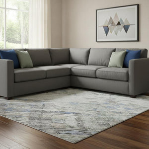 HomeRoots 10' X 14' Abstract Area Rug in Taupe, Blue & Gray - Washable, Stain-Resistant, UV Protected Comfort 684666