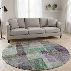 HomeRoots 8' Vibrant Purple and Green Abstract Washable Round Rug with UV Protection for Modern Homes 684687