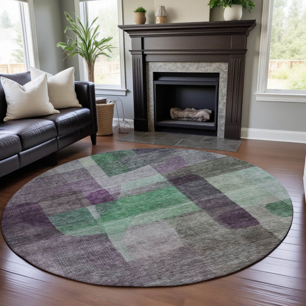 HomeRoots 8' Vibrant Purple and Green Abstract Washable Round Rug with UV Protection for Modern Homes 684687