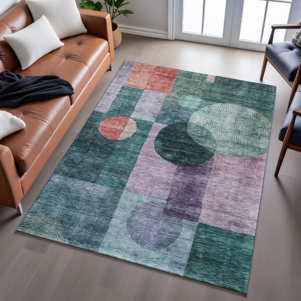HomeRoots 5' X 8' Geometric Area Rug in Green, Coral & Lavender – Washable, UV Protected, Stain Resistant! 684716