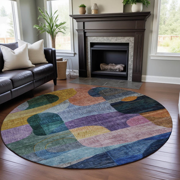 HomeRoots 8' Vibrant Abstract Geometric Round Rug in Blue, Orange, Pink & Purple – Washable & UV Protected! 684747