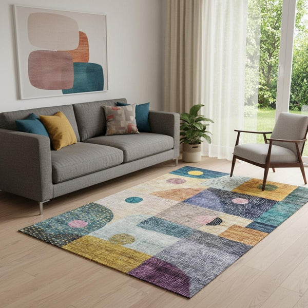 HomeRoots 5' X 8' Vibrant Geometric Area Rug in Green, Teal, Orange & Purple - Washable, UV Protected & Stain Resistant 684800