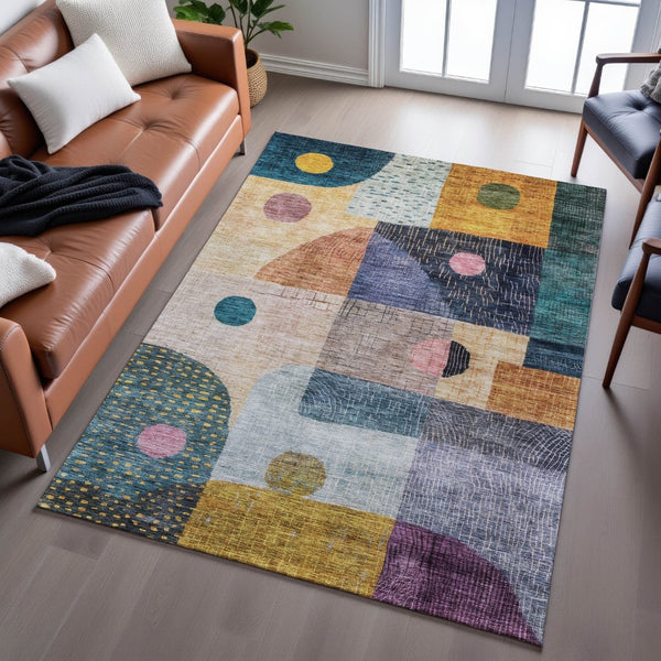 HomeRoots 10' Vibrant Geometric Area Rug in Teal, Green, Orange & Purple - Washable, UV-Protected, Durable Design 684804
