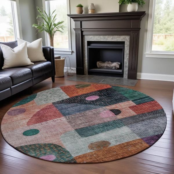 HomeRoots 8' Vibrant Orange, Teal & Purple Geometric Round Rug - Washable, UV Protected for High-Traffic Areas 684813
