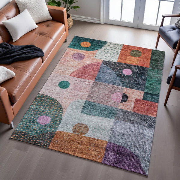 HomeRoots 10' Vibrant Orange, Teal & Purple Geometric Washable Area Rug with UV Protection for Any Space 684816