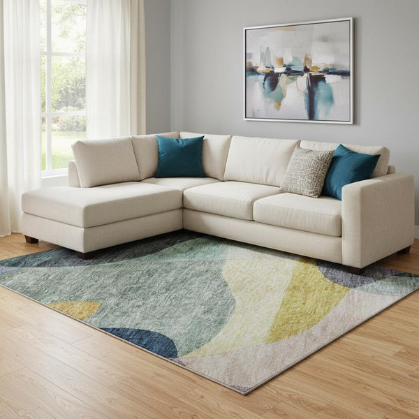 HomeRoots 10' X 14' Washable Abstract Geometric Area Rug in Green, Purple, Gold & Teal - UV Protected & Durable 684834