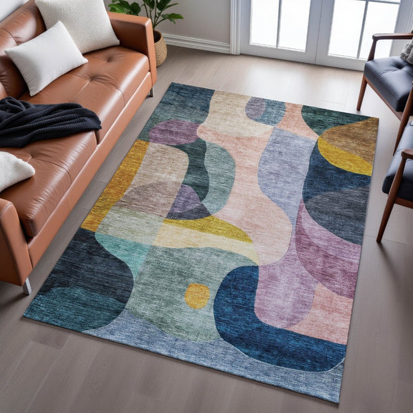 HomeRoots 10' X 14' Washable Abstract Geometric Area Rug in Green, Purple, Gold & Teal - UV Protected & Durable 684834