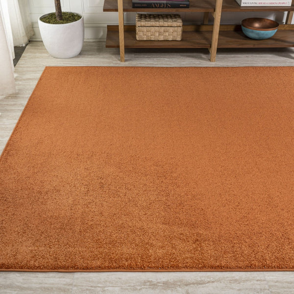 HomeRoots 5' X 8' Orange Area Rug - Vibrant, Durable, Easy-Care Accent for Modern Spaces & Cozy Living Areas 685225