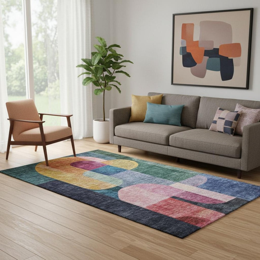 HomeRoots 5' X 8' Abstract Geometric Washable Area Rug in Green, Blue & Pink with UV Protection for Every Room 685254