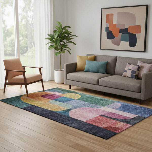HomeRoots 5' X 8' Abstract Geometric Washable Area Rug in Green, Blue & Pink with UV Protection for Every Room 685254