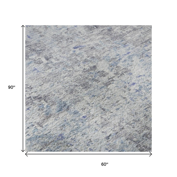 HomeRoots 5' X 8' Sky Blue Gray Silver Abstract Area Rug – Washable, UV Protected, Stylish & Durable for Homes 685393