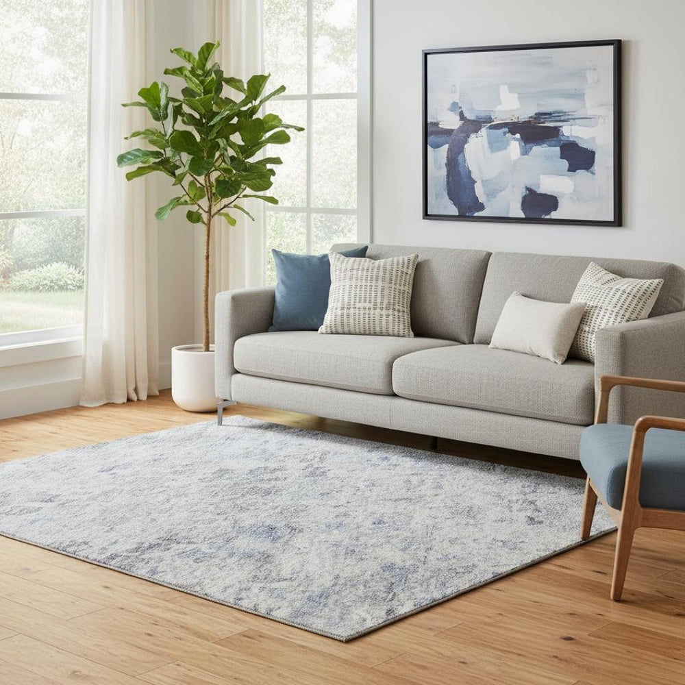 HomeRoots 5' X 8' Sky Blue Gray Silver Abstract Area Rug – Washable, UV Protected, Stylish & Durable for Homes 685393