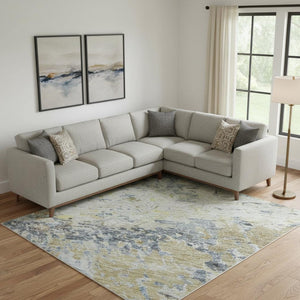 HomeRoots 9' Modern Blue Gold Beige Abstract Washable Area Rug with UV Protection for Stylish Living Spaces 685414