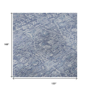 HomeRoots 10' Denim Blue & Beige Floral Area Rug – Washable, UV-Protected, Stain-Resistant Comfort for Homes 686024