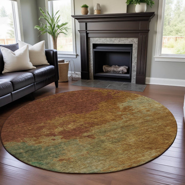 HomeRoots 8' Vibrant Rust Gold and Teal Abstract Washable Round Rug with UV Protection for Family Spaces 686159