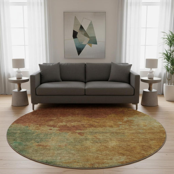 HomeRoots 8' Vibrant Rust Gold and Teal Abstract Washable Round Rug with UV Protection for Family Spaces 686159