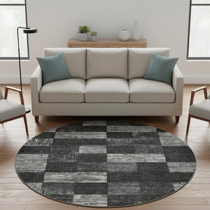 HomeRoots 8' Modern Black Gray Silver Geometric Round Rug - Washable, UV Protected, Durable for High Traffic Areas 686201