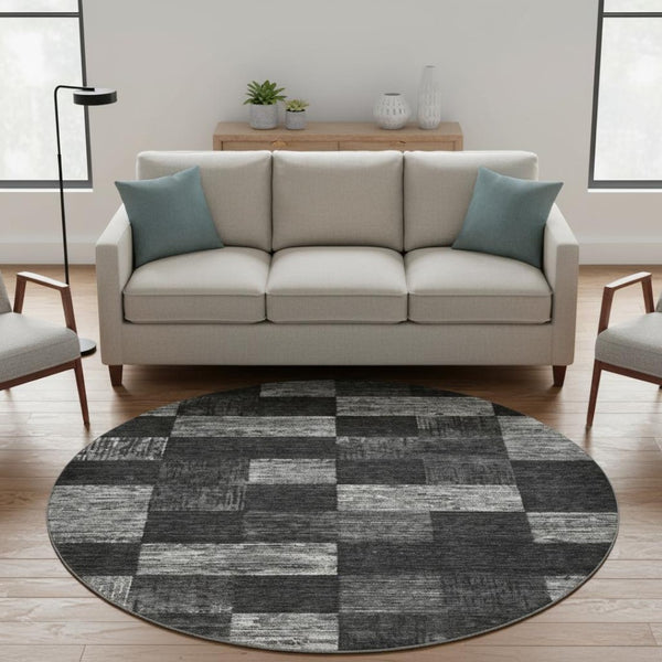 HomeRoots 8' Modern Black Gray Silver Geometric Round Rug - Washable, UV Protected, Durable for High Traffic Areas 686201
