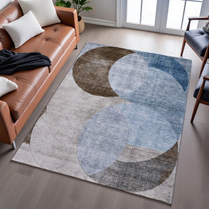 HomeRoots 9' X 12' Geometric Area Rug in Denim Blue, Brown & Beige - Washable, UV-Protected & Durable Design 686257