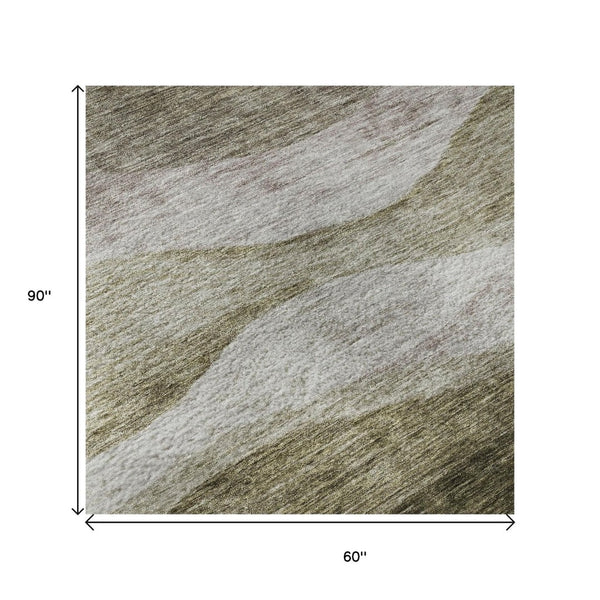HomeRoots 5' X 8' Abstract Beige and Taupe Area Rug - Washable, UV-Protected, Durable for High Traffic Spaces 686344