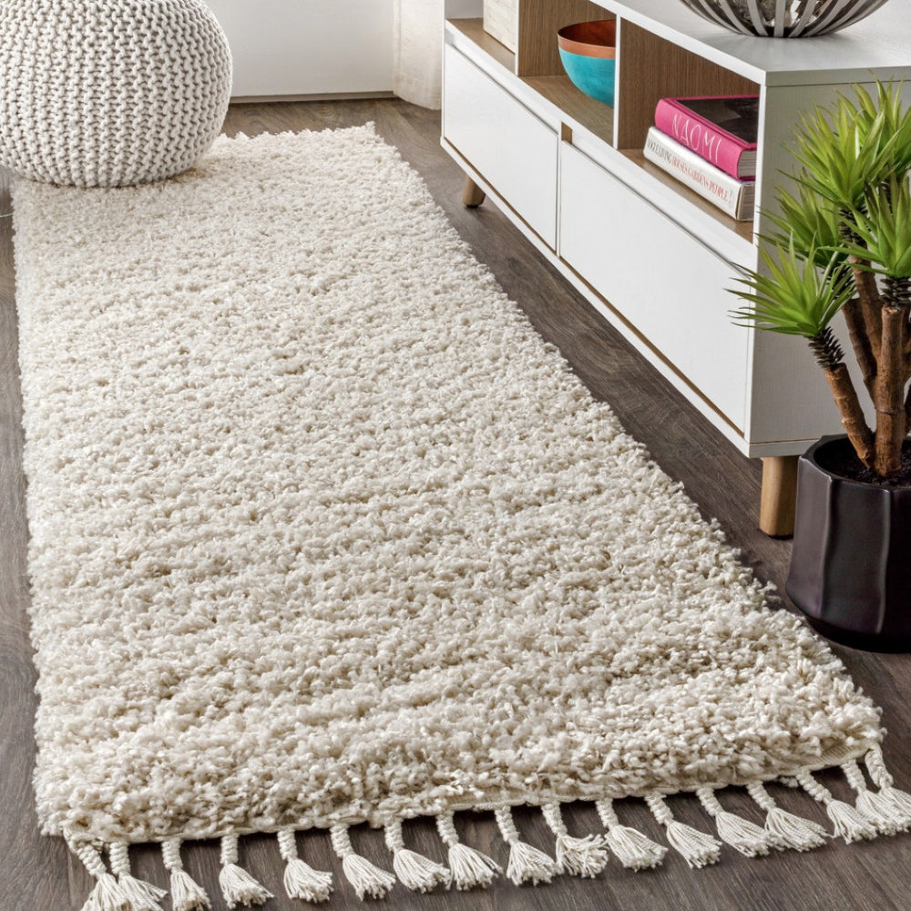 HomeRoots 8' Cream Runner Rug with Fringed Tassels - Stylish, Durable, and Soft for High-Traffic Spaces 686621