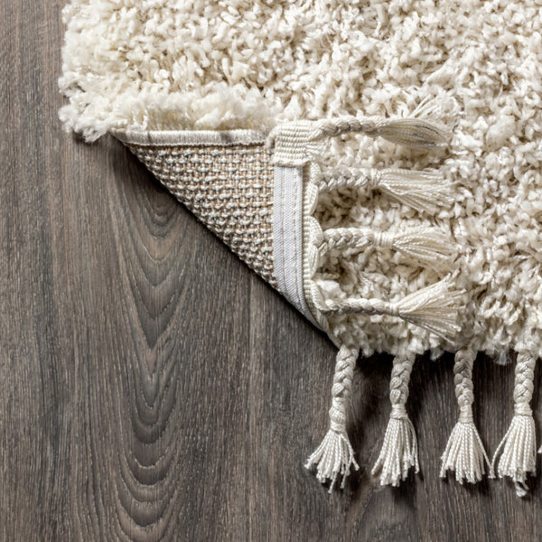 HomeRoots 8' Cream Runner Rug with Fringed Tassels - Stylish, Durable, and Soft for High-Traffic Spaces 686621