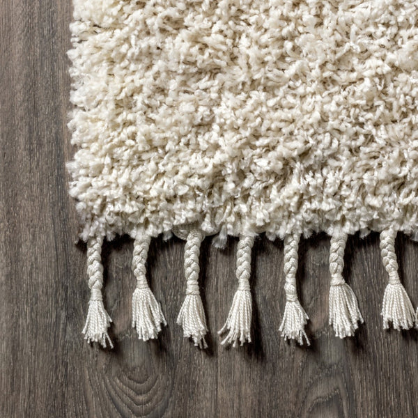 HomeRoots 8' Cream Runner Rug with Fringed Tassels - Stylish, Durable, and Soft for High-Traffic Spaces 686621
