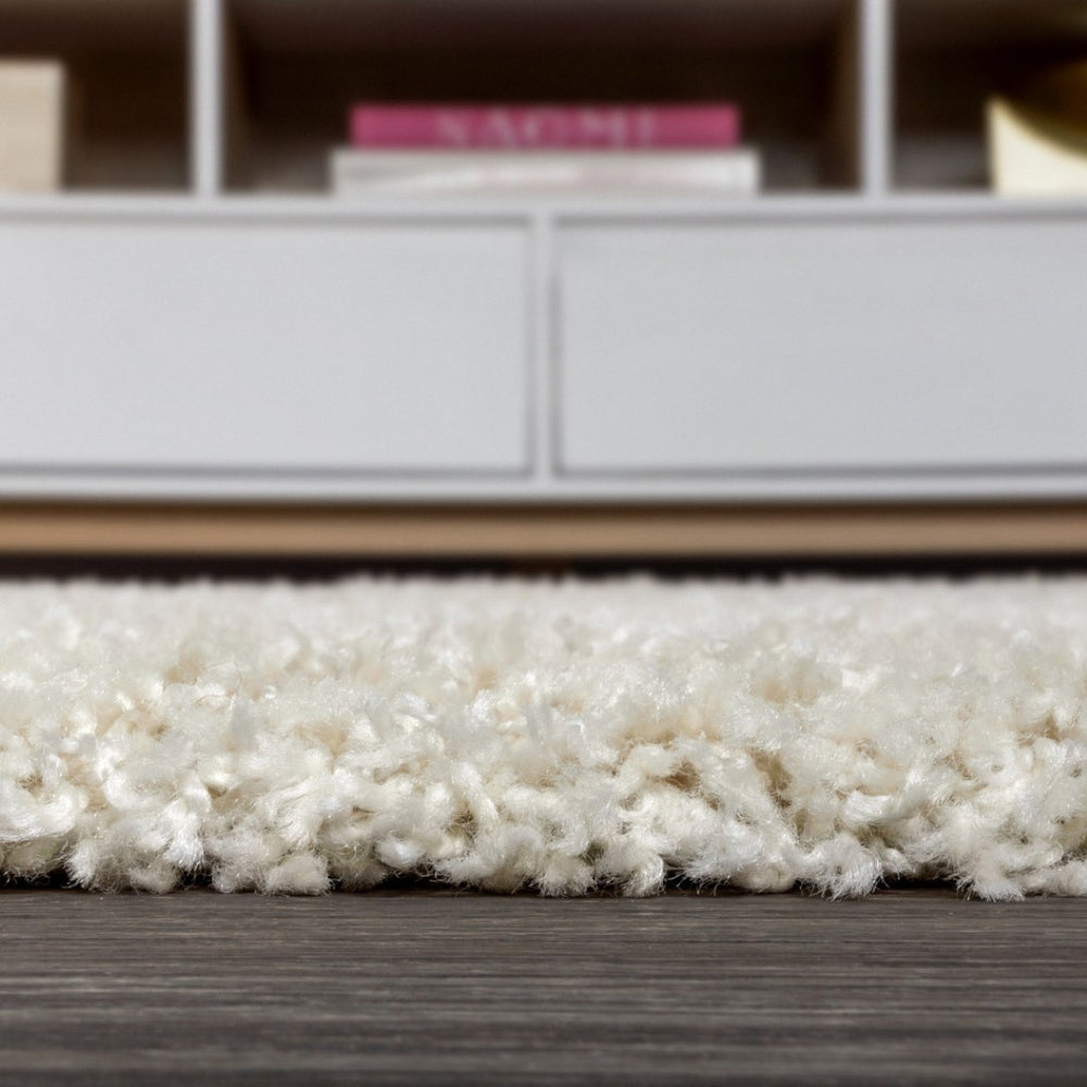 HomeRoots 8' Cream Runner Rug with Fringed Tassels - Stylish, Durable, and Soft for High-Traffic Spaces 686621