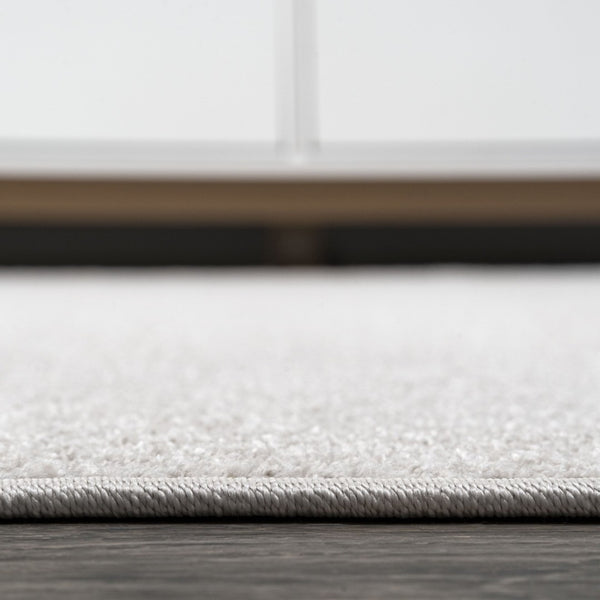 HomeRoots 9' x 12' Cream Area Rug - Durable, Elegant, and Easy-Care Design for Living & Dining Spaces 686640