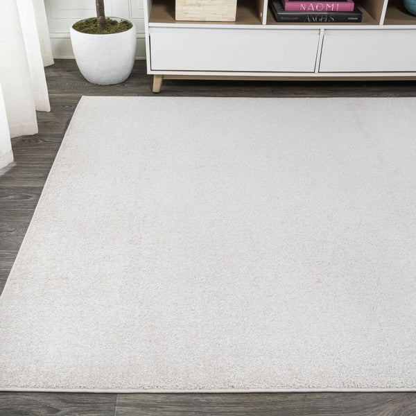 HomeRoots 9' x 12' Cream Area Rug - Durable, Elegant, and Easy-Care Design for Living & Dining Spaces 686640