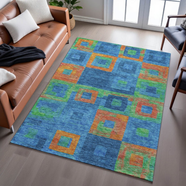 HomeRoots 5' X 8' Washable Geometric Area Rug in Denim Blue, Orange & Green – Stylish, Durable & Pet-Friendly! 686677